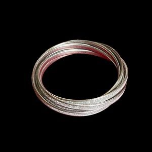 Statement Set 6 Intertwined Silver and Glitter Bangle Bracelets Beautiful